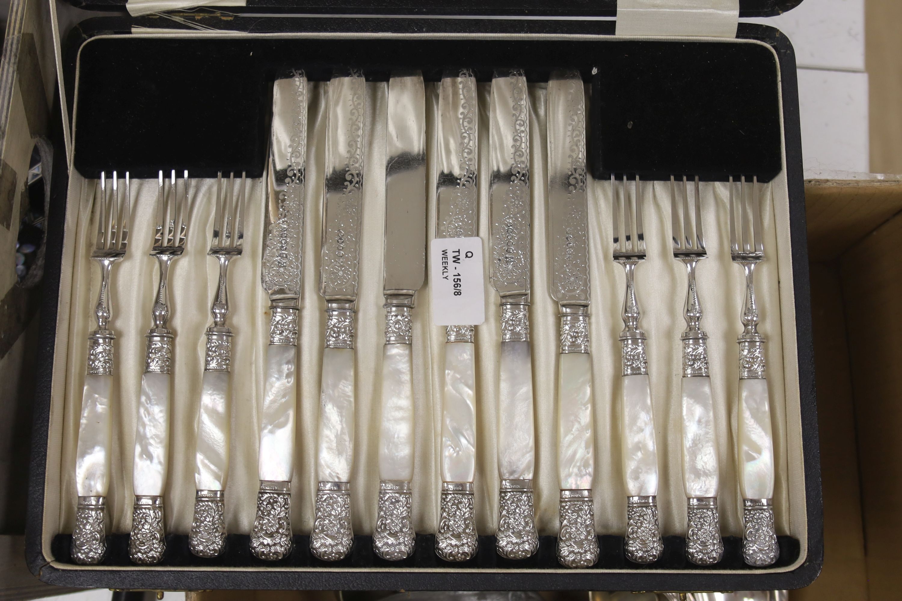 A cased set of plated and mother of pearl-handled fruit eaters and miscellaneous plated flatware and other items